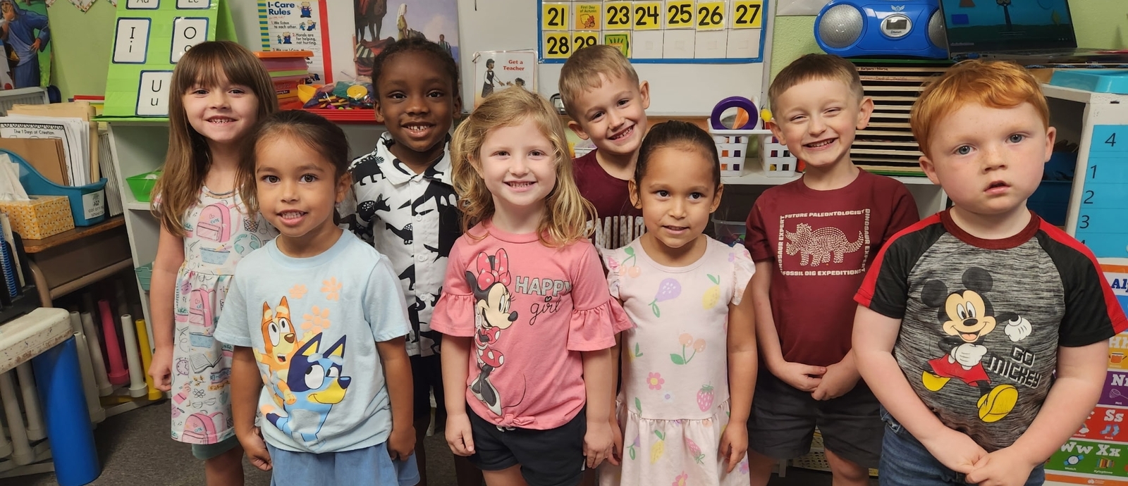 Children eat together at tables